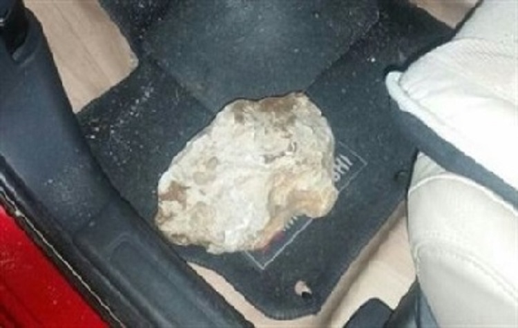 Rock Which Pierced Windshield of Victims Car Injuring Three